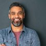 istockphoto-1319763462-612x612 Close up face of handsome mature man with beard looking at camera. Happy mid adult indian man isolated against grey wall. Portrait of smiling mixed race guy on gray background with copy space.